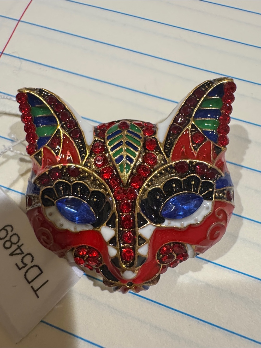 Beautiful cat head with red stones